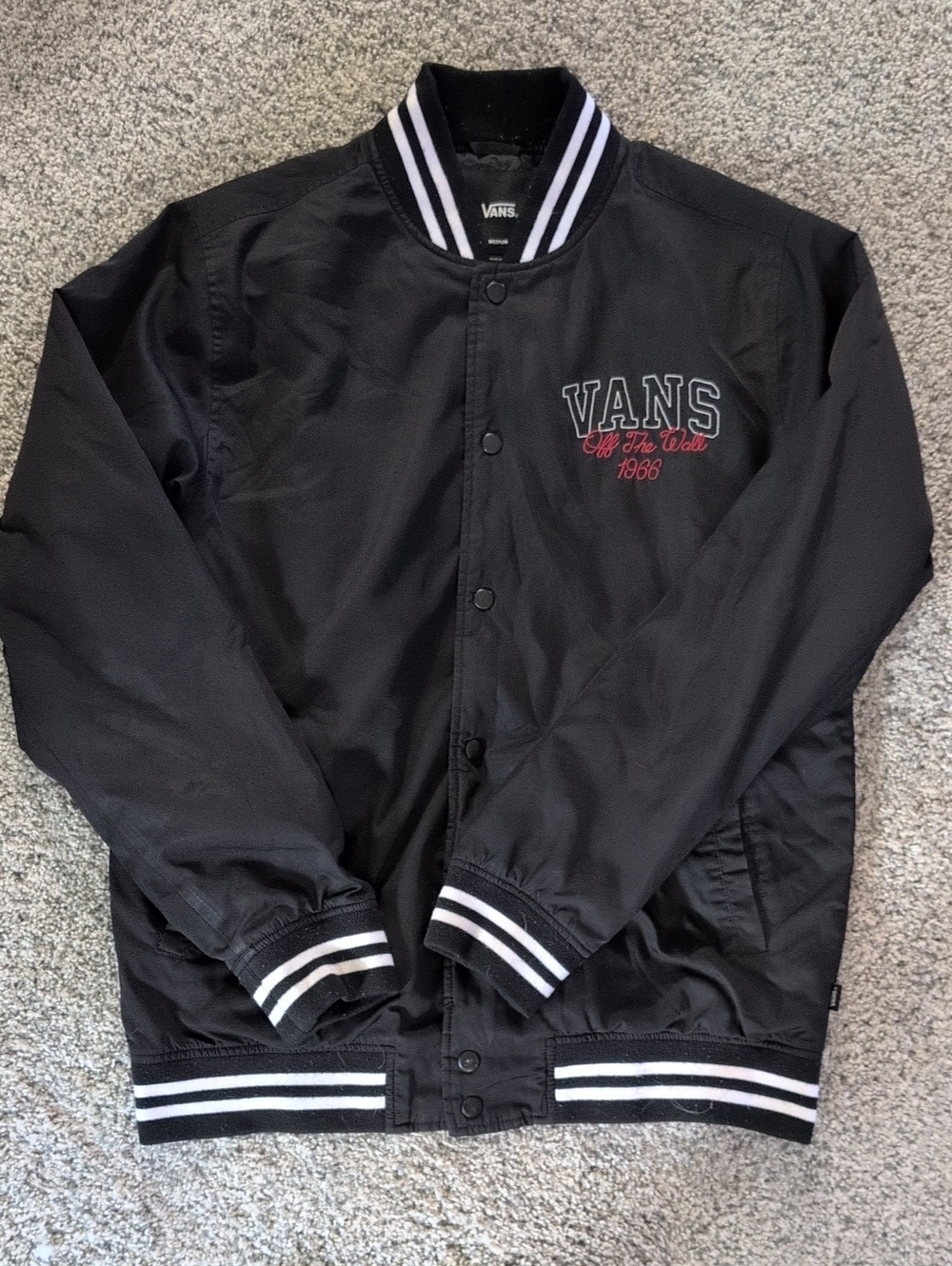 Vans Black Bomber Jacket with White Stripe Trim and Red Script